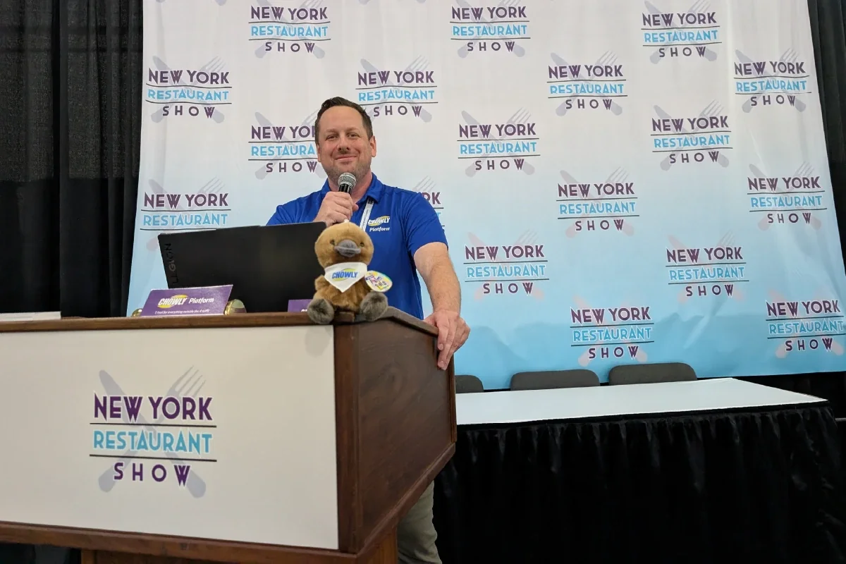Chowly team member presenting at a restaurant show