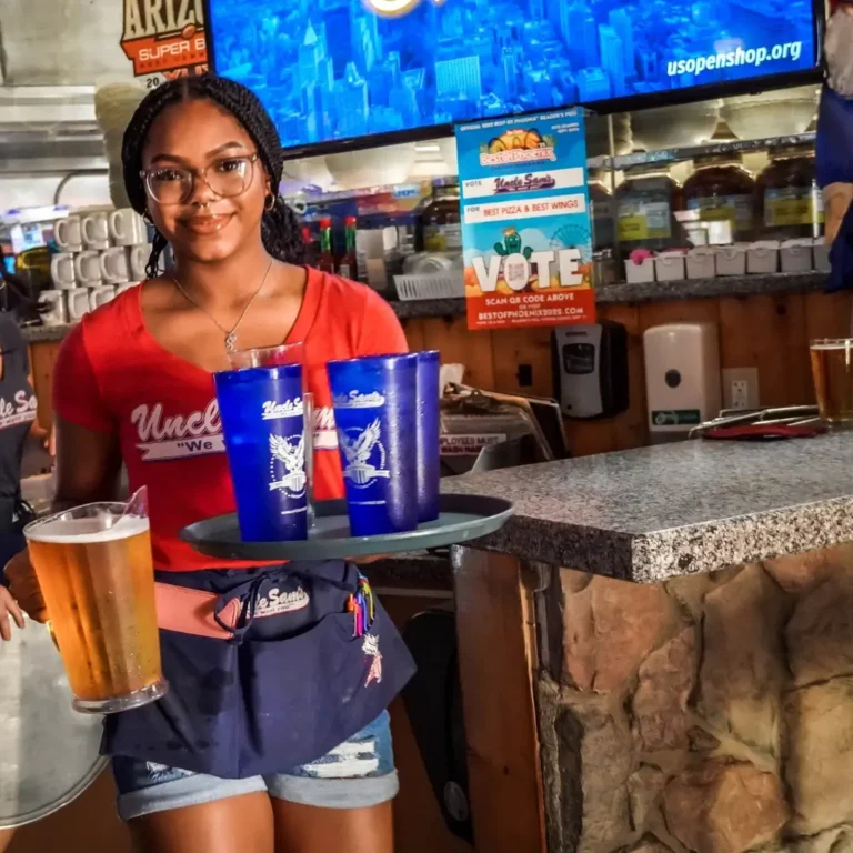 Uncle Sam's server with beer pitcher