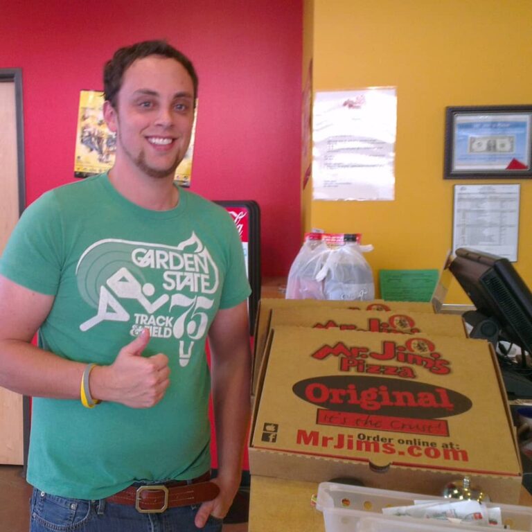 MrJims.Pizza - happy customer with pizza